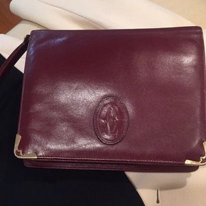 COPY - Cartier wristlet handbag.